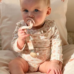 Broderet suttesnor, bows