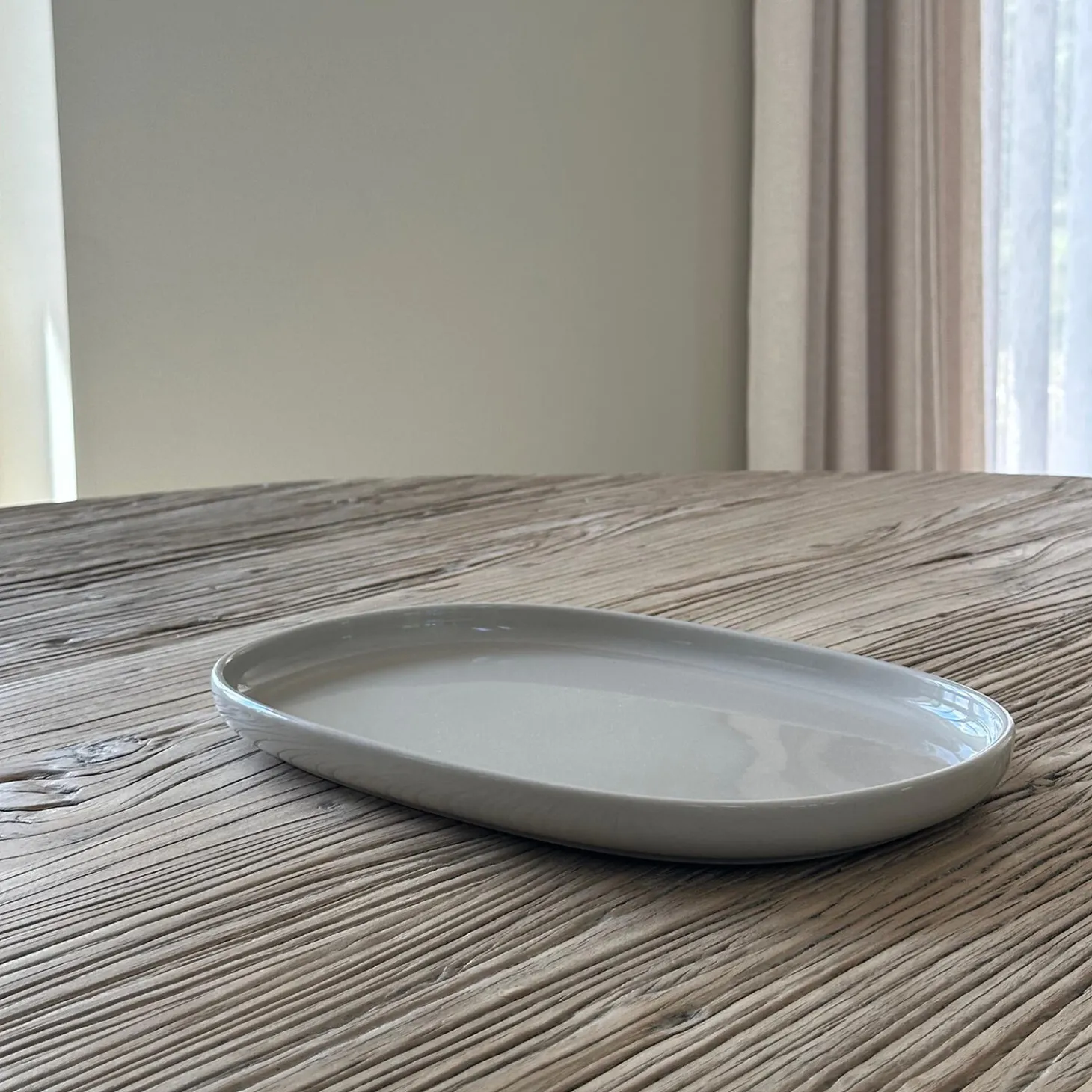 CAPRI Oval Tallerken, varm sand