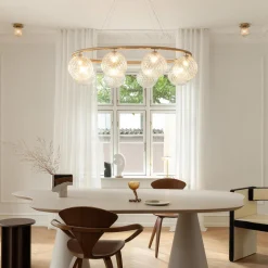 Miira 8 Oval, brass/optic clear