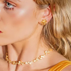 SEA TRAVELLER ØRERINGE, forgyldt/lysegul